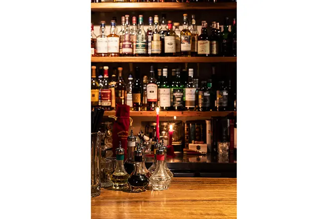 A stylish and inviting bar interior, showcasing sophisticated architectural design by leading architects in Canberra