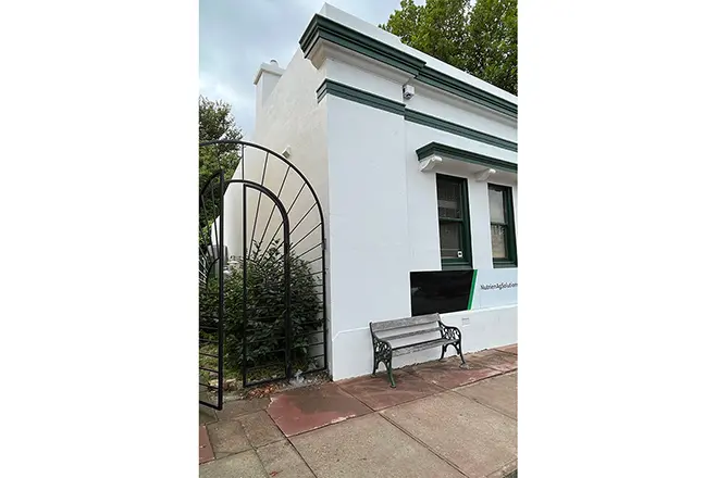 A majestic heritage building showcasing intricate details, exemplifying architectural services that preserve Canberra's rich history